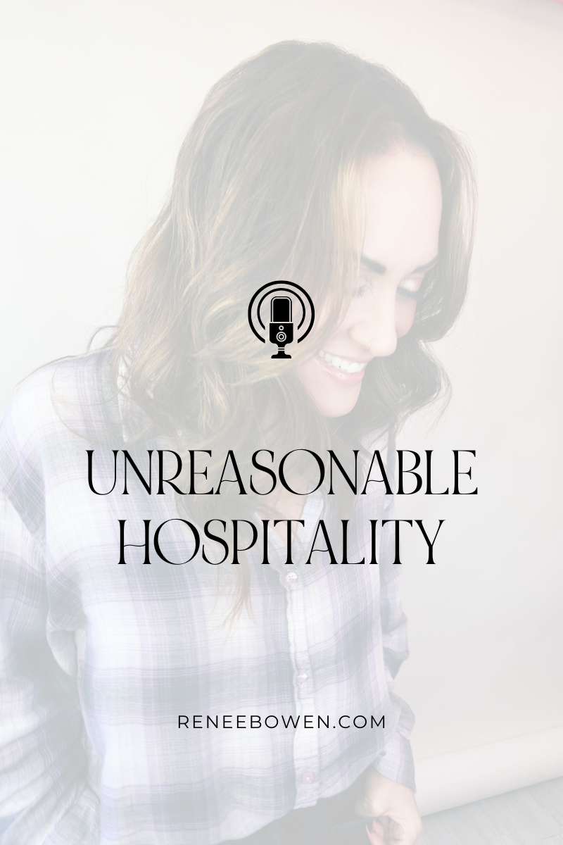 RENEE BOWEN PODCAST HOST LOOKING DOWN LAUGHING IN PURPLE PLAID SHIRT